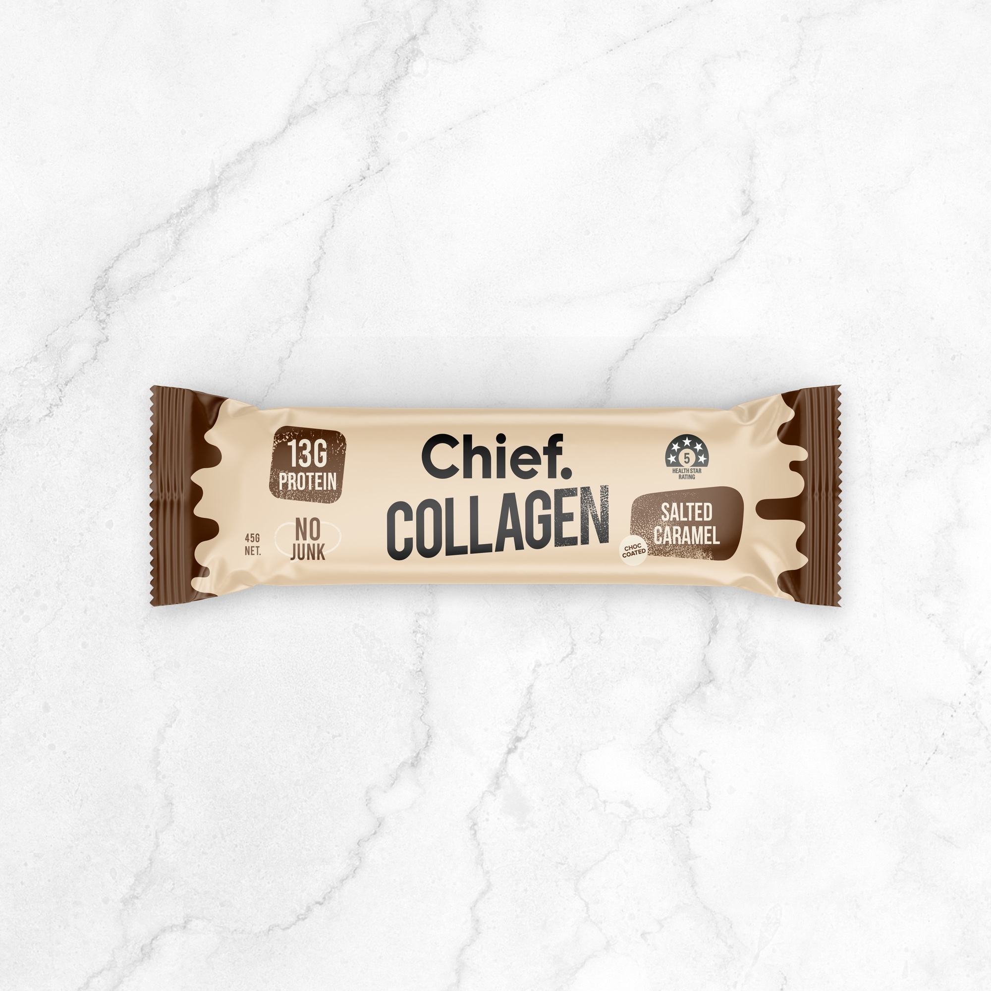 Image of Chief Collagen Salted Caramel on light grey marble kitchen countertop
